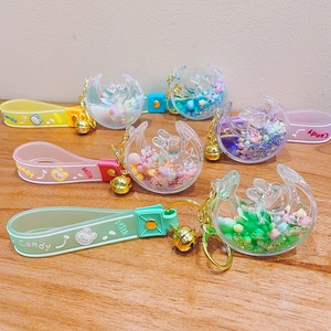 Colorful moon acrylic liquid quicksand keychains with stars and silicone wrist straps