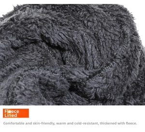 Close-up of thick black fleece lining for winter hat with soft thermal texture