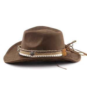 Detail of faux suede western cowboy hat with studded braided band and star webbing decor