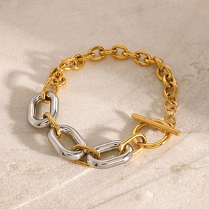 Two-tone geometric chain bracelet with silver oval links and gold T-bar toggle clasp