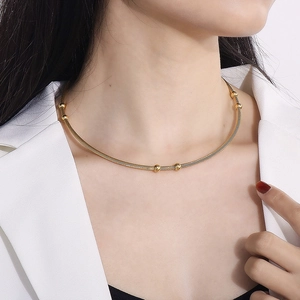 Chic two-tone stainless steel wire choker necklace with bead accents on model