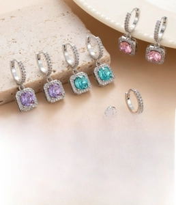 Macro shot of colorful cubic zirconia earrings with 8mm inner diameter and silver finish