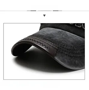 Detailed close-up of brown leather cap brim with premium double-stitch sewing finish