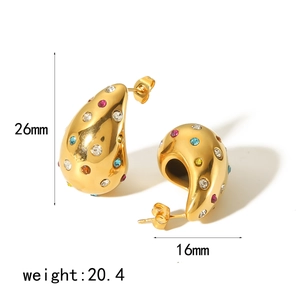 Detail view of gold teardrop earrings with colorful stones, size 26mm by 16mm