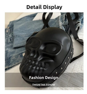 Detail shot of a black skull backpack featuring 3D embossed design and silver metal rivets