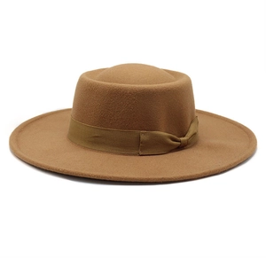 British style wool felt boater hat with flat brim and decorative ribbon in camel color