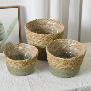 Three-piece seagrass basket set with green color-block and waterproof liner