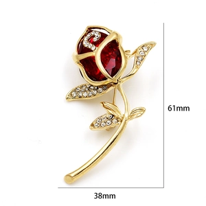 Macro detail of red crystal rose brooch with measurements 61mm height and 38mm width