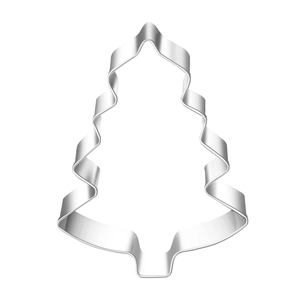 Macro detail of a silver stainless steel Christmas tree shaped metal cookie cutter
