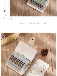 Close-up of white PU leather cat card holder with multi-slot accordion style PVC interior
