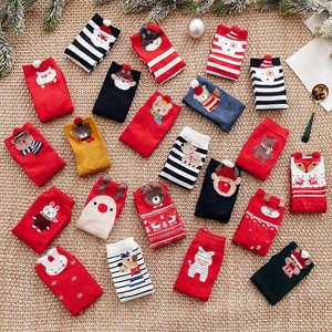 Festive Christmas cartoon crew socks featuring 3D holiday embroidery and vibrant colors