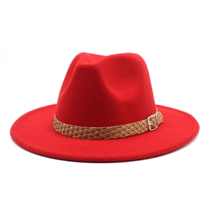Close-up of red wool felt fedora with brown braided band and silver metal buckle detail