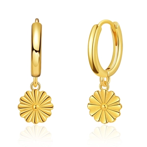 Detail of 18K gold plated huggie earrings featuring delicate daisy flower pendants