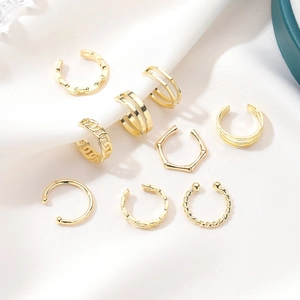 Set of 9 gold-plated U-shaped ear cuffs with chain and textured minimalist designs