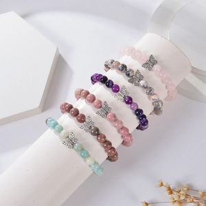 8mm Pink Zebra Stone Bracelet with Butterfly Charm and Natural Beaded Texture