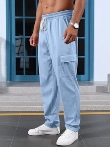 Men's light blue cargo pants featuring elastic drawstring waist and side flap pockets