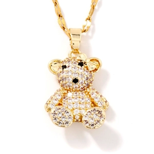 Luxury gold bear necklace with full micro-pave crystals and delicate bow detail