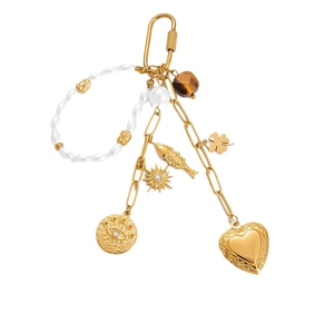 Golden DIY multi-charm keychain with heart lock, evil eye, and pearl accents on white background