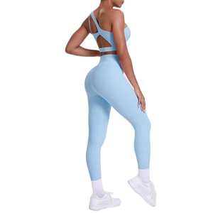 Light blue one-shoulder yoga bra and high waist leggings set for fitness and gym wear