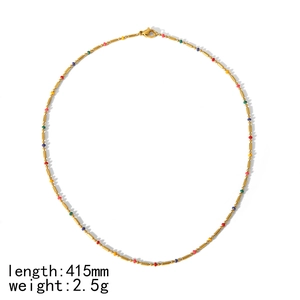 Detail of colorful beaded necklace with gold metal tubes 415mm long and 2.5g weight