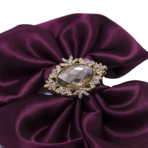 Deep purple satin bow nylon baby headband with sparkling rhinestone centerpiece
