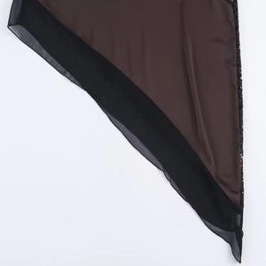 Detail of silk satin and chiffon splicing with lace trim on dark brown midi dress