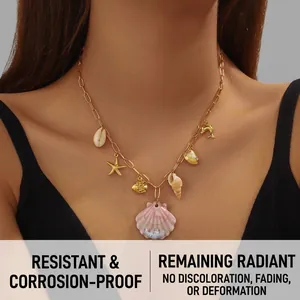 Detail of gold-plated ocean theme necklace with shell starfish and dolphin charms