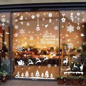 White Christmas window stickers set with reindeer and snowflake motifs for glass decor