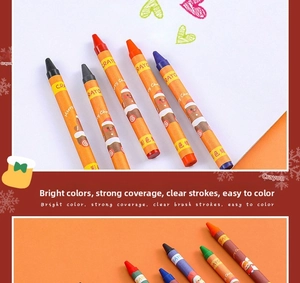 Macro detail of Christmas themed crayons with snowman patterns and festive colors