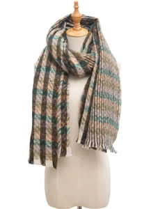 Detail of checkered shawl with fringe in dark green, caramel, and beige knit fabric