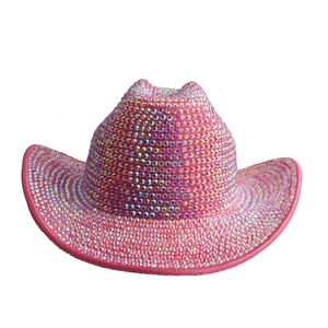 Close-up of pink cowboy hat with hand-applied iridescent rhinestones for party wear