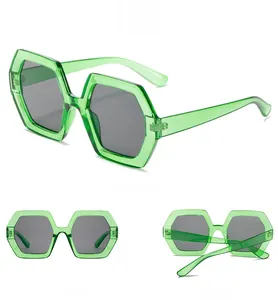Detail view of hexagonal green frames and gray lenses with multi-angle display