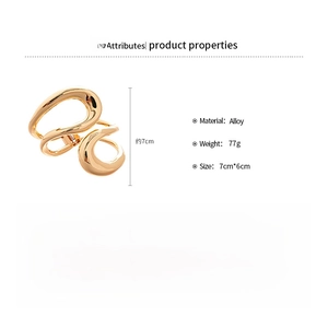 Detail view of gold irregular geometric bracelet showing alloy material and 77g weight
