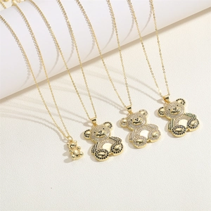 Cute gold bear pendant necklaces with black and white zircon stones in four sizes