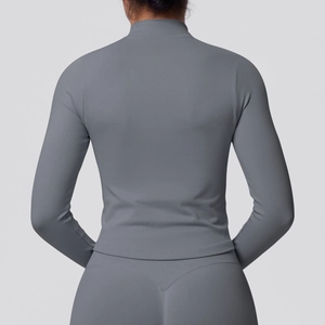 Close-up back view of gray slim-fit yoga top with textured knit and stand collar