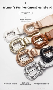 Detailed close-up showing high quality cowhide belts in diverse colors and metal buckles