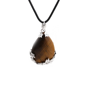 Tiger eye crystal teardrop pendant necklace with leaf patterned silver base on black cord