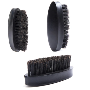 Three-angle views of curved men's beard brush with black boar bristles and wooden base