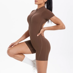 Detailed side view of dark brown mocha yoga bodysuit with front zipper and short sleeves