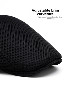 Detail of breathable black mesh cap showing the foldable brim and airy texture
