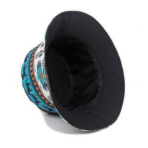 Reversible bucket hat with blue and orange geometric patterns and pegasus silhouette motifs