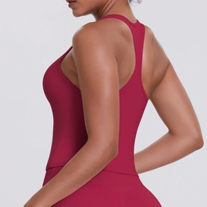 Detail of racerback design on women's dark red high-elasticity sports yoga tank top