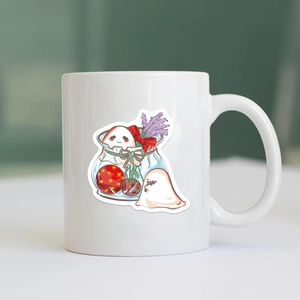 Close-up of cute cartoon ghosts and lavender illustration on white ceramic mug