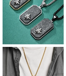 Detail of forged carbon fiber military tag necklace with octagonal star emblem for men