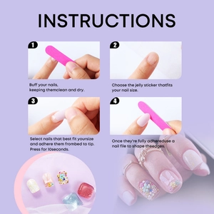 Detail showing high-quality 3D floral press-on nail application with pearl accents