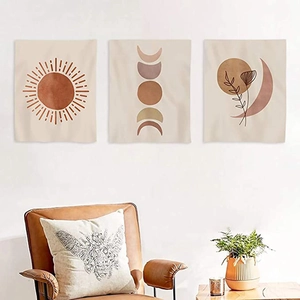 Three-piece bohemian wall art set featuring sun and moon phases in warm terracotta tones