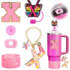 Pink glitter straw cover and charm set with butterfly and letter X for 40oz tumblers