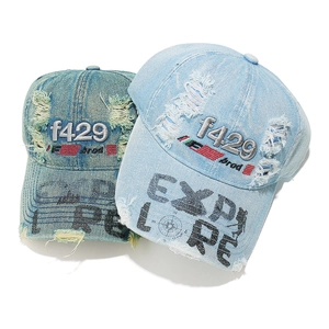 Vintage denim baseball caps with distressed holes and explore embroidery in blue colors
