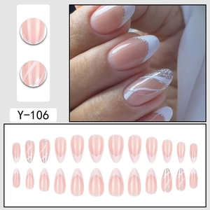 French tip almond press-on nails with silver glitter and white abstract stripes