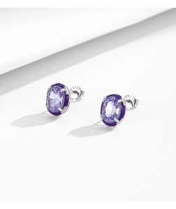 Detail of S925 sterling silver stud earring with purple gemstone and enamel accents